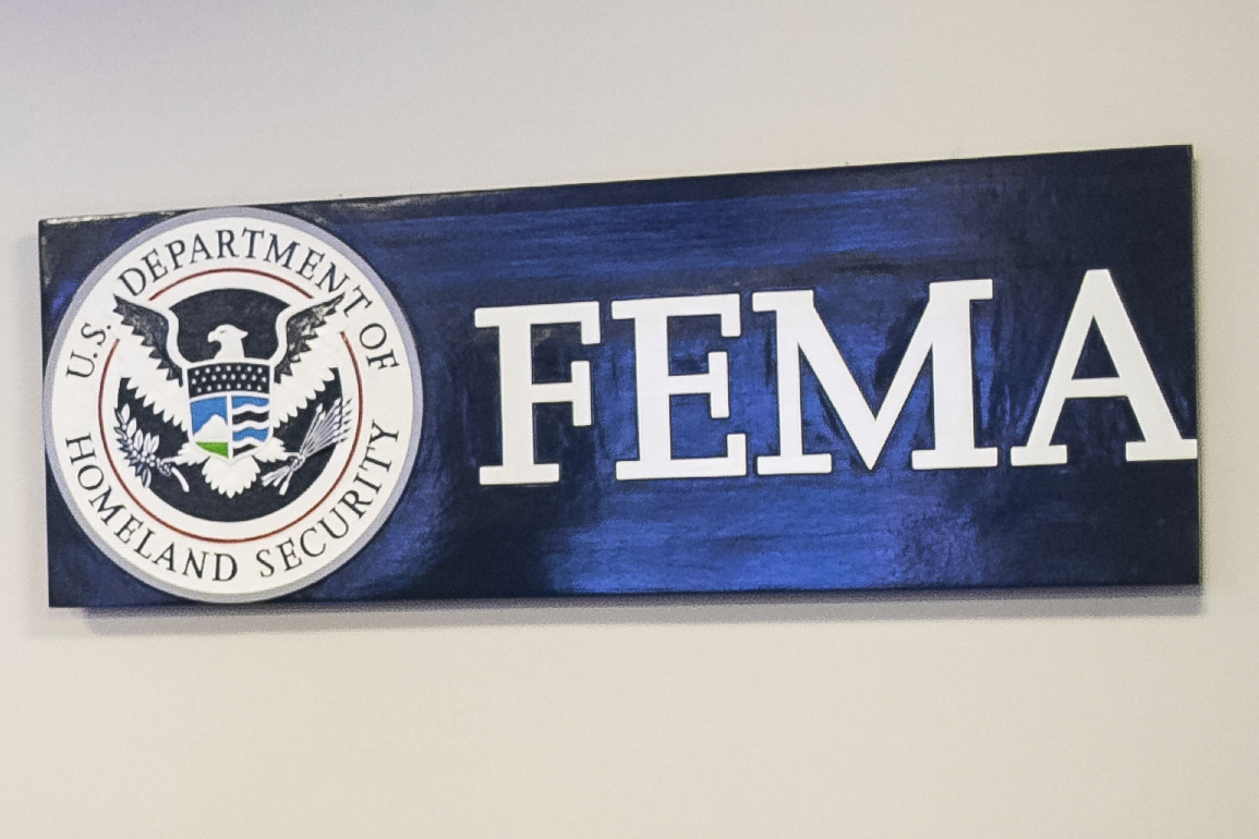 FILE - A sign for the Federal Emergency Management Agency is pictured at FEMA headquarters, April 20, 2020, in Washington. (Al Drago/The New York Times via AP, Pool)